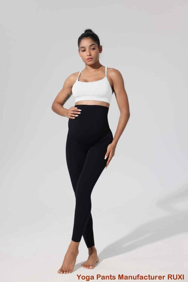 Leggings acampanados de cintura alta con entrecruzamiento